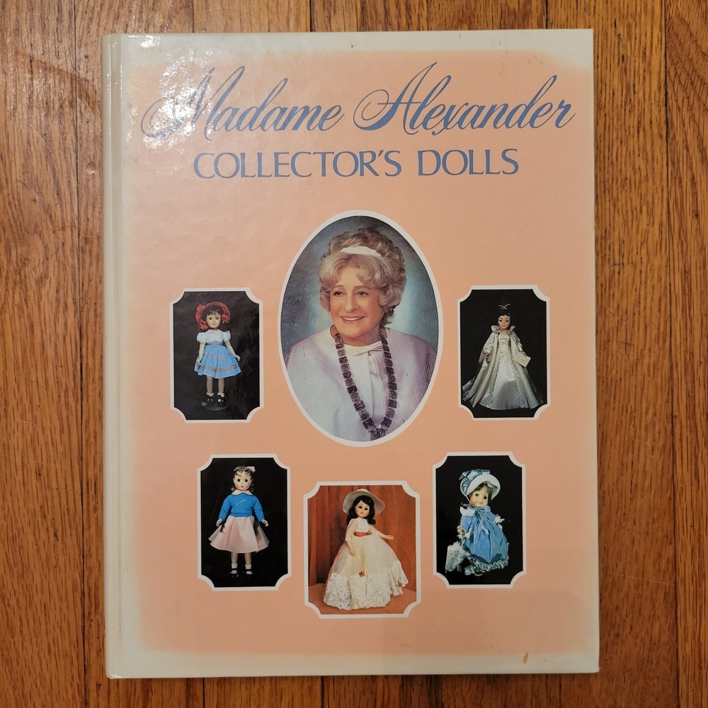 Madame Alexander Collector's Dolls Book - Peach Cover with Blue Accents